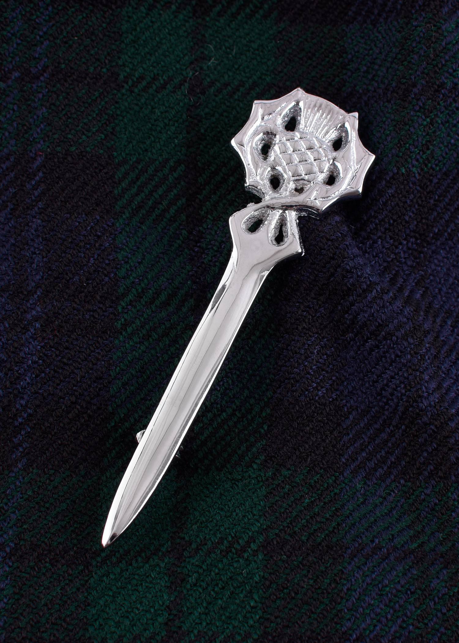 Kiltpin Distel, Kiltspeld