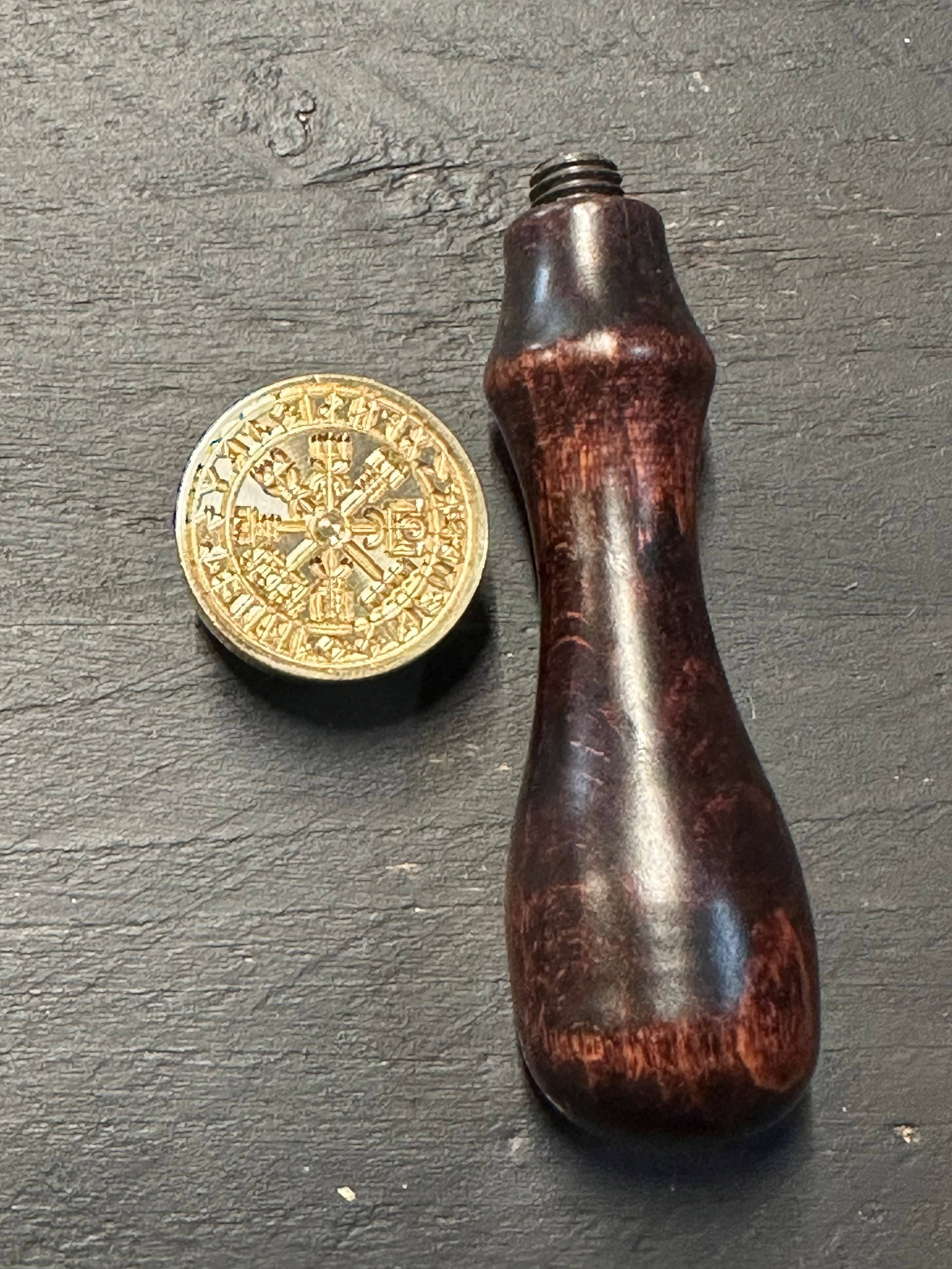 ​​​​​Zegelstempel met Vegvisir logo