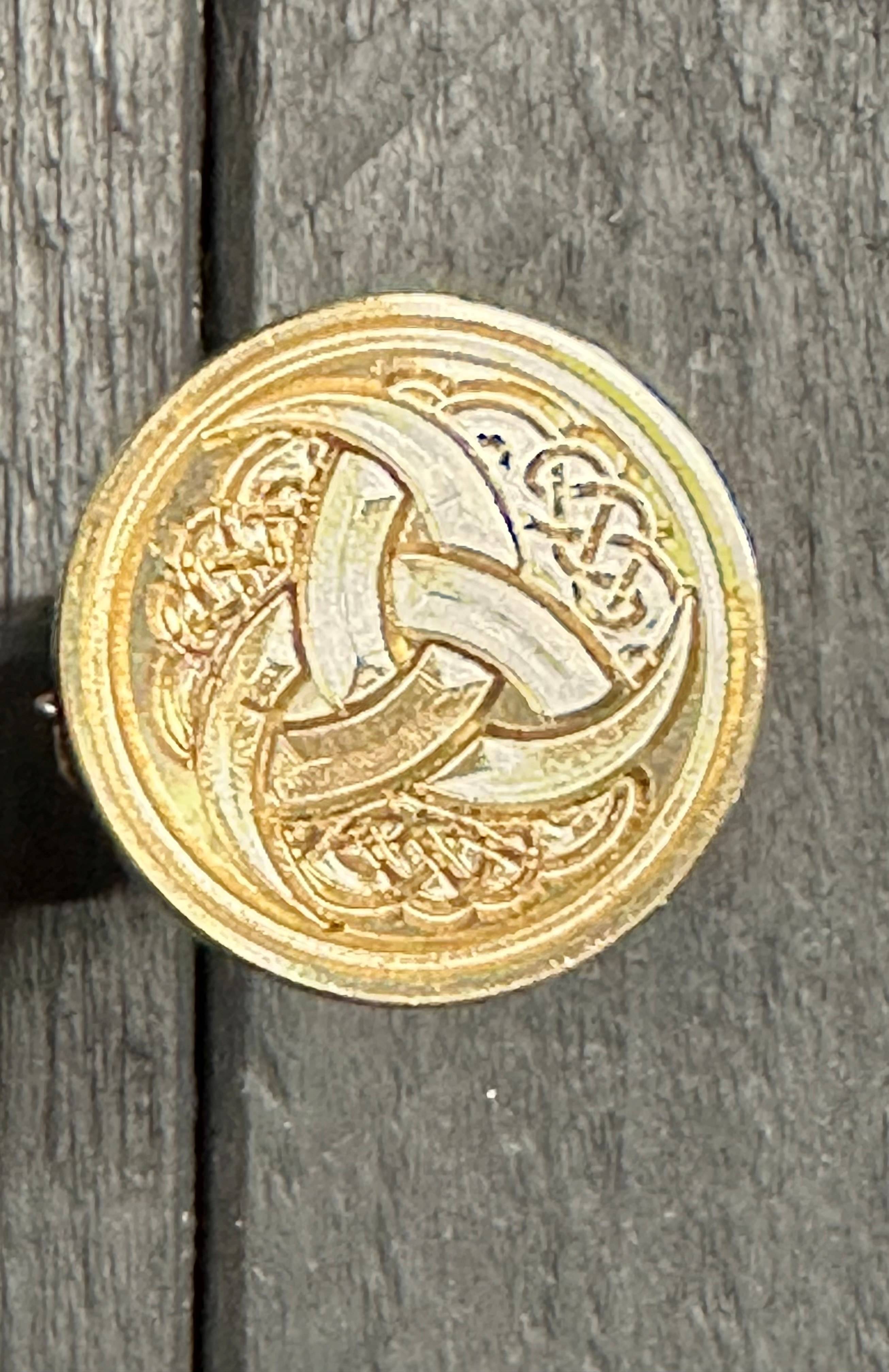 ​​​​Zegelstempel met Trinity logo